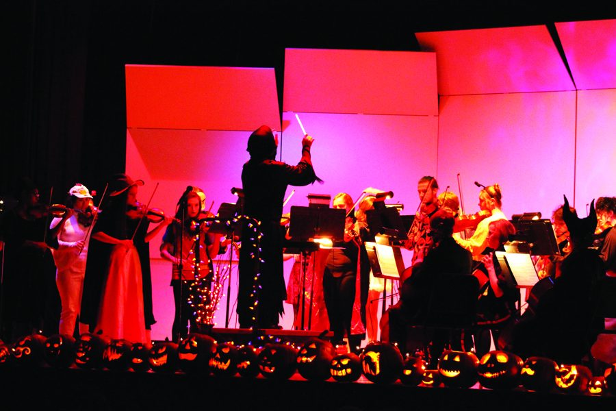 Orchestra+teacher+Steve+Olson+conducts+the+Halloween-inspired+concert+at+CMR+in+October.