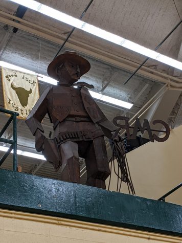 Branding blatantly represented and celebrated through the iron statue in the CMR gymnasium.