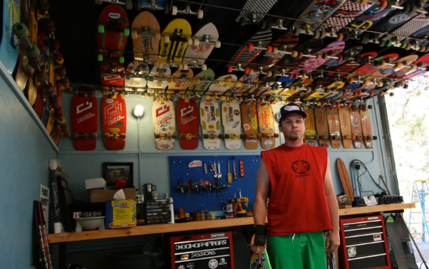 Jeff Ament poses with his skateboard collection, courtesy of Jeff Ament 
