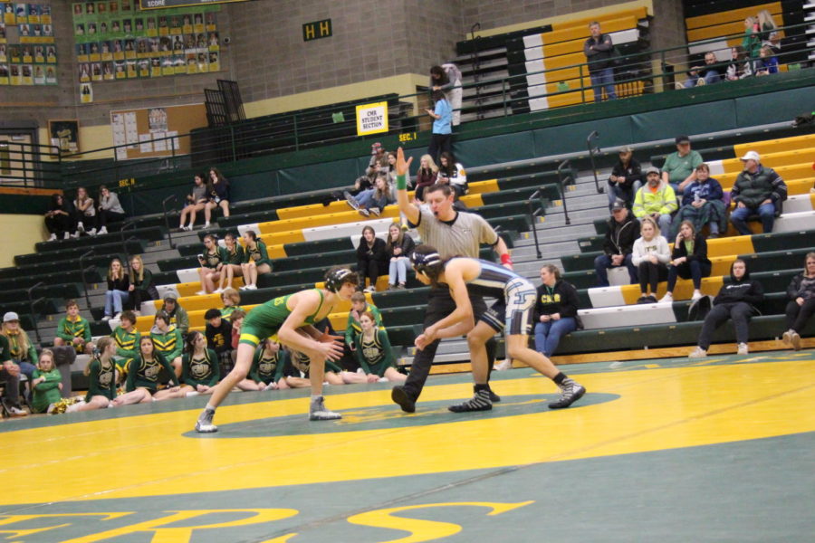 On Jan. 27, junior Cole Dejean competes in the crosstown wrestling event in the CMR fieldhouse.