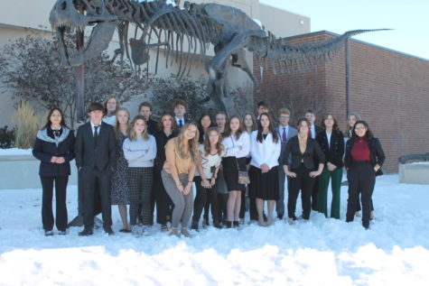 The CMR speech and debate team take a moment to relax while at a tournament in Bozeman.