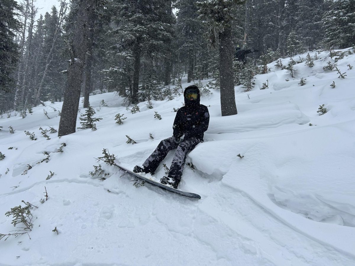 On Dec. 26 , junior snowboarder Will Kenyon enjoys a snowy day with friends at Showdown Montana ski area.