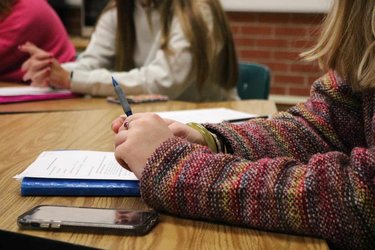 On Jan. 8, students in first period U.S Government class discuss their court cases.