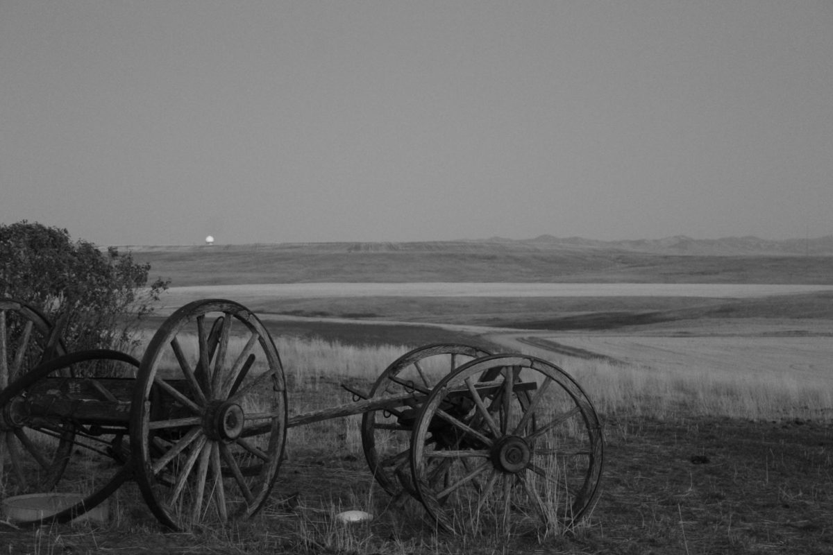 On Oct. 24, Just a few miles outside of Great Falls, old farming equipment sits over the horizon of rural Montana.