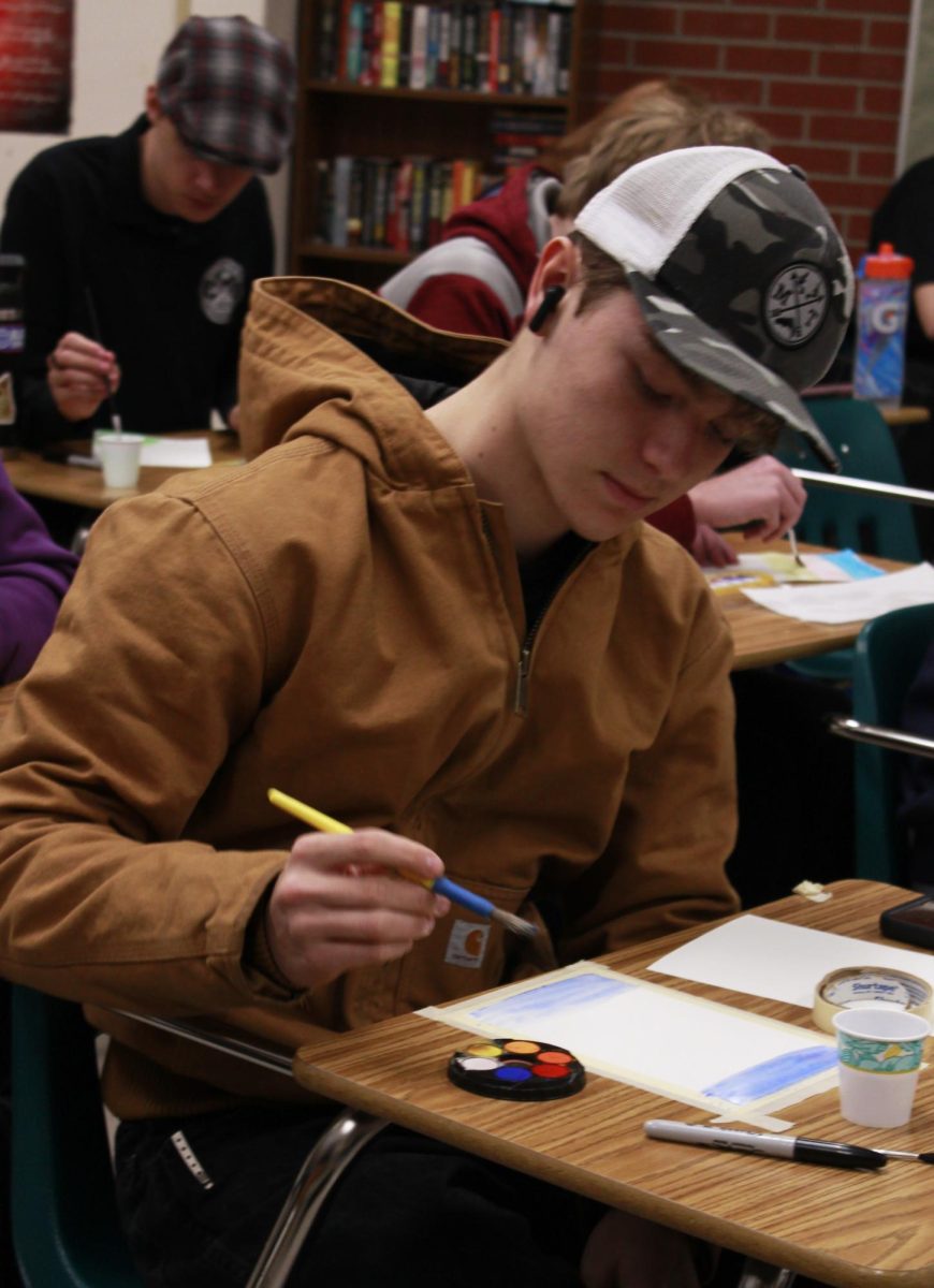 A student in Ryan Anderson’s English class begins to watercolor during first period on Jan. 8.