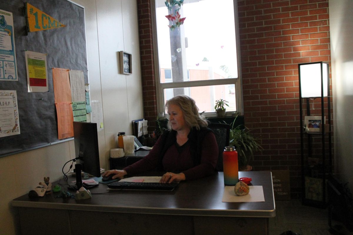 Riki Johnson, one of five counselors of Charles M. Russell High School, starts her work in her office as the morning goes by. 
