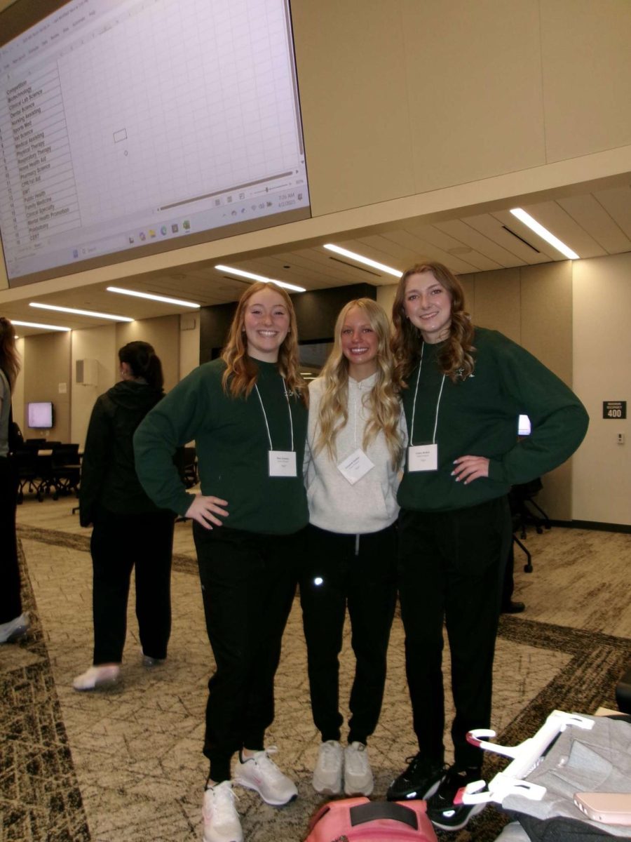  Shae Sweeney, Elizabeth Duddon and Lainey Bralick competing at Rocky Vista College in 2025 season. 