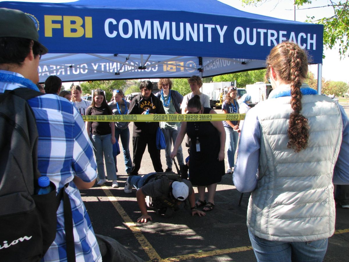 On Sept. 23, sophomores from CMR test their physical strength at the FBI tent at the annual WOW Day at College of Great Falls-MSU and the University of Providence.