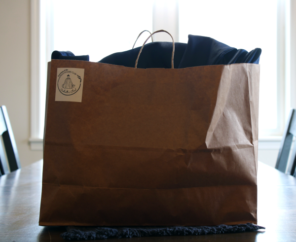 A bag full of sparkle! Cinderella's Closet provides affordable dress options, having been extremely helpful in 2026.